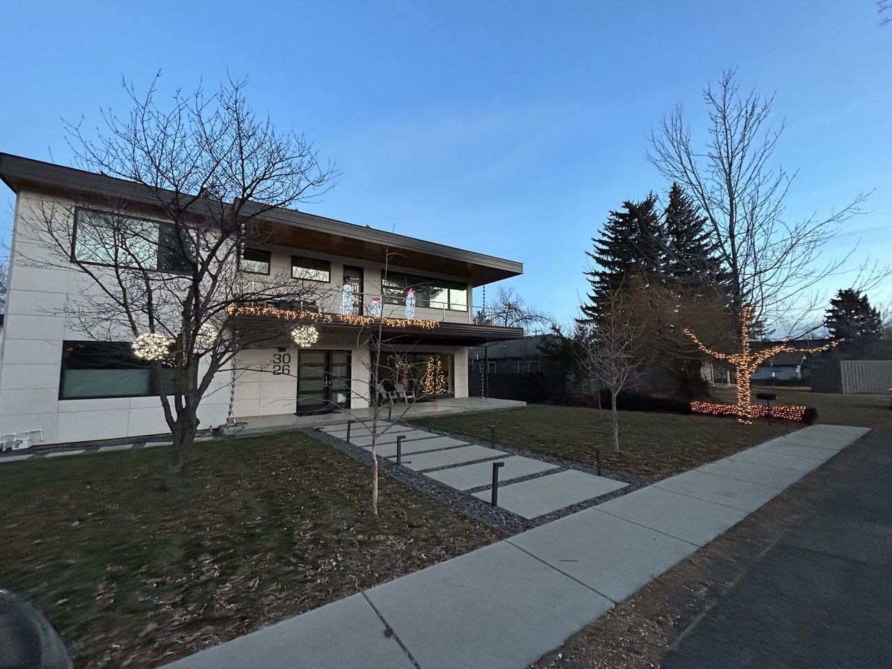 Remodeled two-story Boulder, CO home in winter with holiday lights