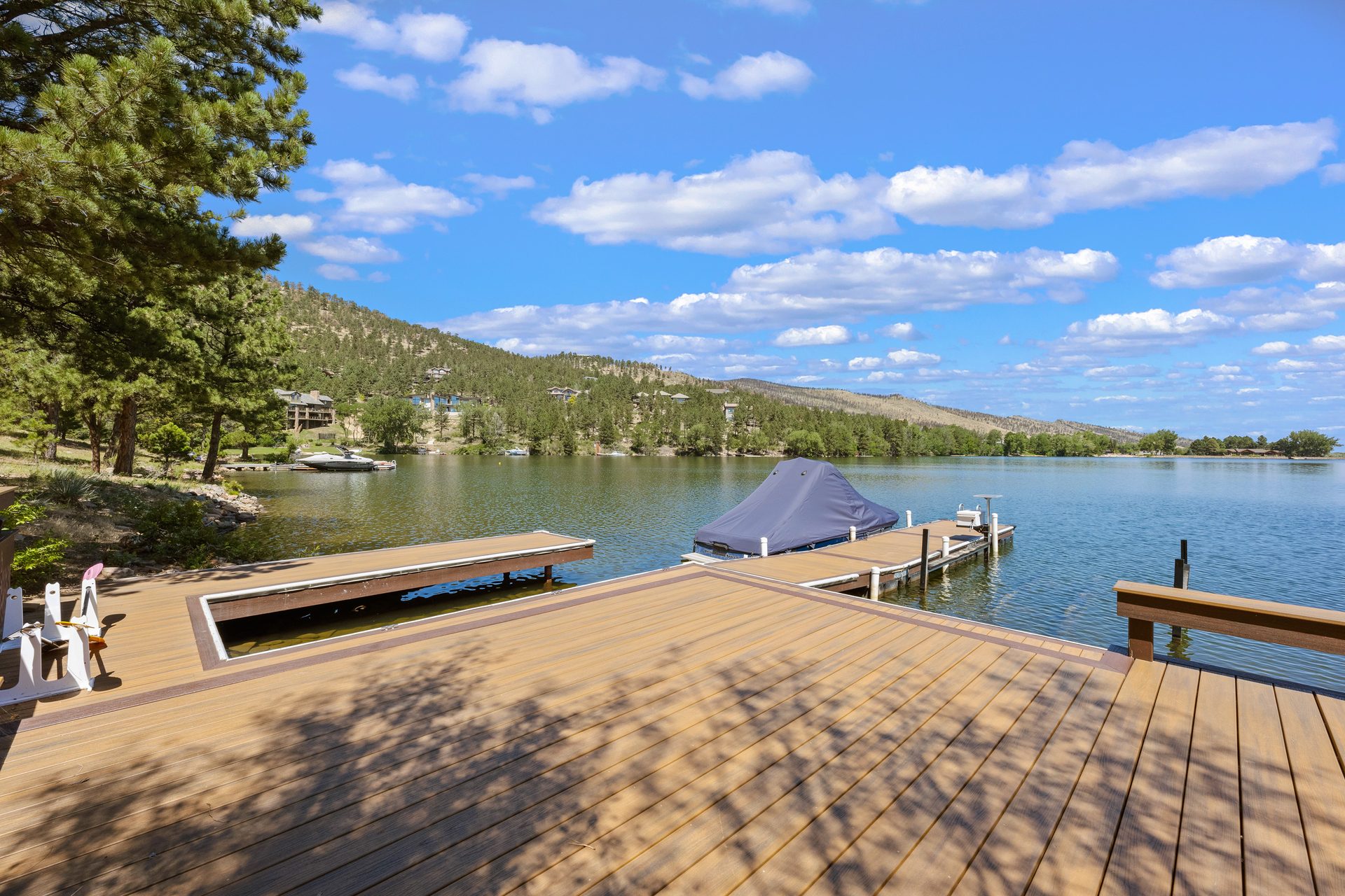 Lakeside dock with composite decking built by Prana Construction